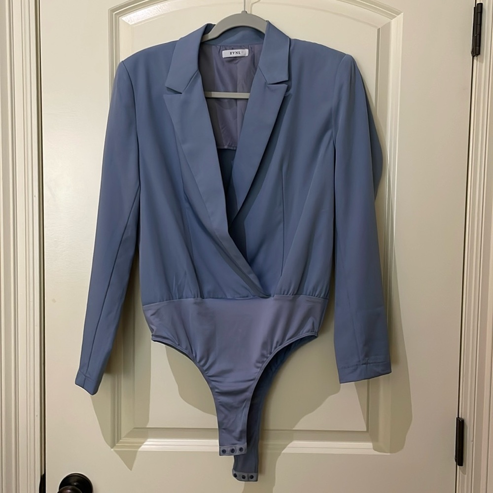 Blue bodysuit.